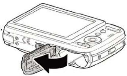 Line drawing of a digital camera module with an open lid and internal components (no text or symbols)