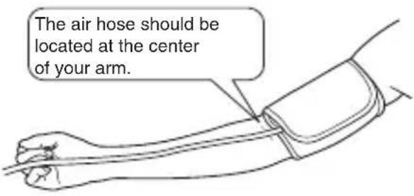 The air hose should be located at the center of your arm.