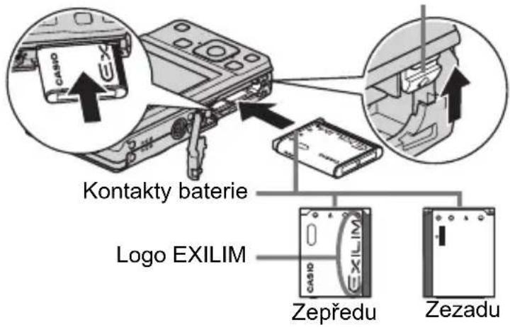 CASIO Exilim EX-Z27 - Otevřete víčko komůrky pro baterie. - 2