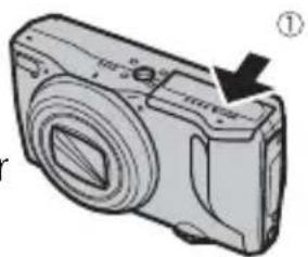 FUJIFILM FinePix F775EXR - Open the battery-chamber cover. - 1
