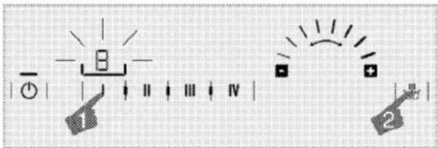 Cropped image showing a control panel with indicator lights and labeled buttons, including '1' and '2' with directional arrows.