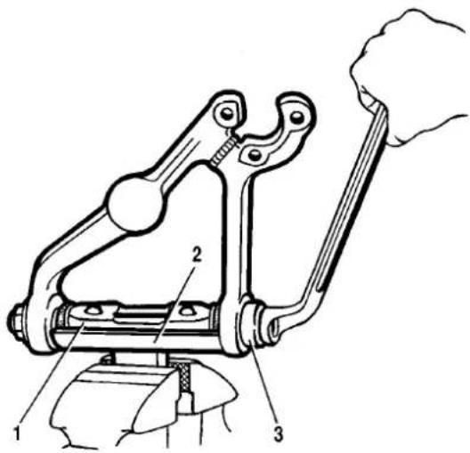 Technical diagram of a mechanical clamp or bracket assembly with numbered parts labeled 1, 2, and 3.
