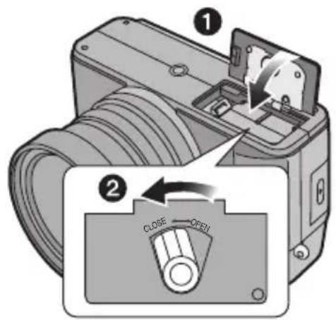 Diagram showing a device with labeled parts and an open switch mechanism, illustrating mechanical operation steps.