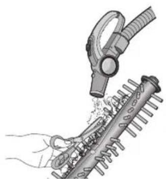 Illustration of a hand using a spray gun to clean or store plastic components on a bamboo mat (no text or symbols).