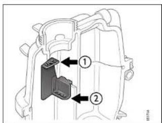 Technical diagram of a mechanical component with numbered parts and directional arrows indicating assembly or flow.