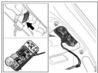 Technical diagram showing a device with labeled components and an arrow indicating a specific section.