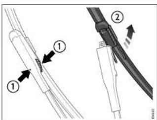 Technical diagram showing two cable connector assemblies with labeled parts and directional arrows indicating assembly steps.