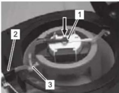 Labeled mechanical component diagram showing three numbered parts of a circular assembly