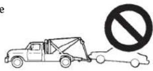 Diagram showing a tow truck and a car with a no-smoking symbol, likely indicating a vehicle safety or parking restriction.