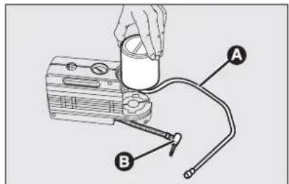 Diagram showing a hand operating a device labeled A and B with a cable or probe inserted, likely illustrating a mechanical or electrical setup.