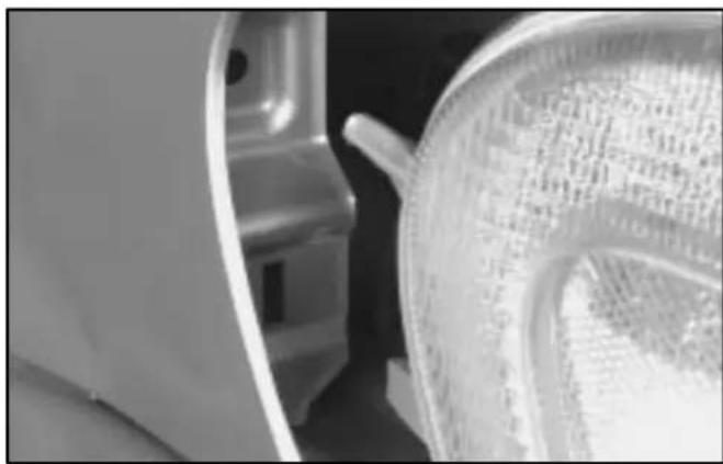 Close-up of a car interior showing the roof and seat area (no visible text or symbols)
