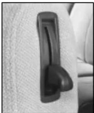 Close-up of a black plastic clip attached to a textured surface (no visible text or symbols)