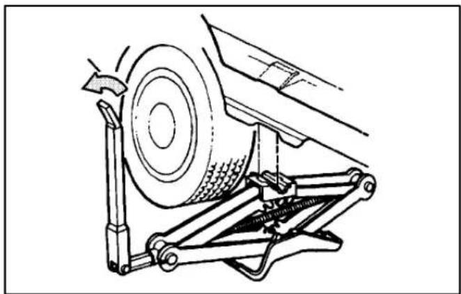 Technical line drawing of a car suspension system with a wheel and attached bracket (no text or symbols)