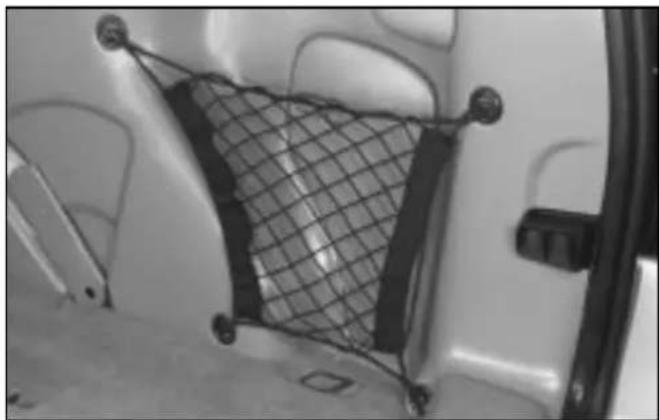 Interior view of a vehicle showing a mesh cushion and car seats (no visible text or symbols)