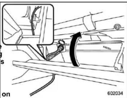 Technical diagram showing mechanical assembly with labeled components and a directional arrow indicating motion or movement.