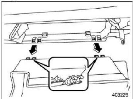 Technical diagram showing mechanical assembly steps with arrows indicating movement and a magnified inset highlighting a component detail.