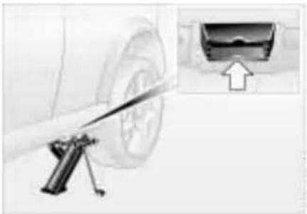 Mechanical device with lever and inset showing a close-up of a component (no visible text or symbols)