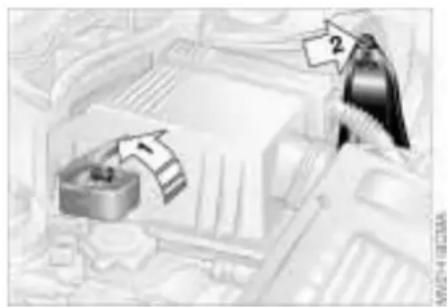 Diagram showing a mechanical or electrical component with labeled parts and directional arrows indicating flow or movement.