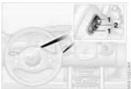 Technical diagram showing a mechanical component with labeled parts and an inset view of a tool interacting with a component.