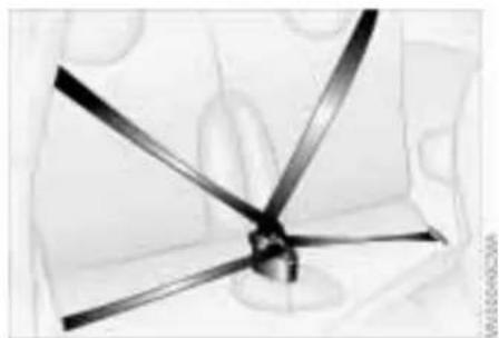 Close-up of a four-bladed propeller or fan assembly (no visible text or symbols)