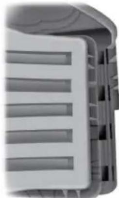 Close-up of a mechanical component with parallel grooves (no visible text or symbols)
