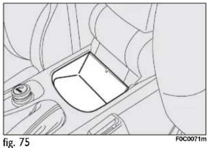 Line drawing of a car interior with a highlighted seat and dashboard (no text or symbols)