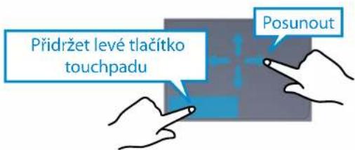 Přidržet levé tlačítko touchpadu Posunout