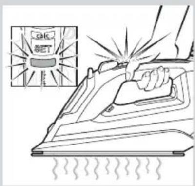 Illustration of a steam iron being brushed with a 'OK SET' label, showing motion and heat effect.