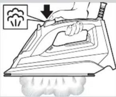 Diagram showing a hand using a steam iron to press down a smoke cloud, with an icon indicating the smoke emission process.