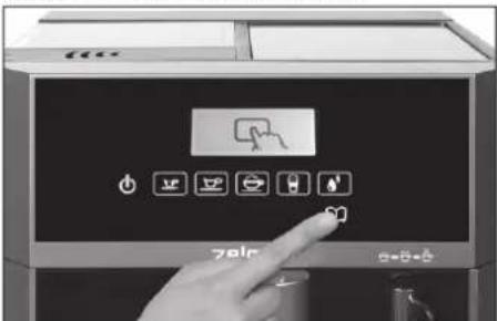 Close-up of a hand pressing a button on a device control panel with icons for battery, switch, and battery.