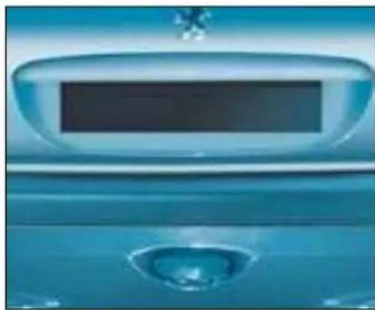 Close-up of a blue car front panel with a digital display and decorative base (no visible text or symbols)