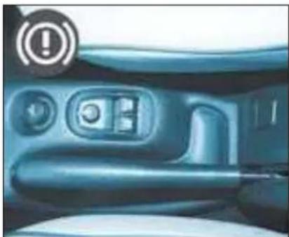 Close-up of a car interior showing dashboard and control buttons (no readable text or symbols)