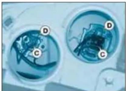 Close-up of two circular mechanical components with labeled points D and C, no readable text or symbols present.
