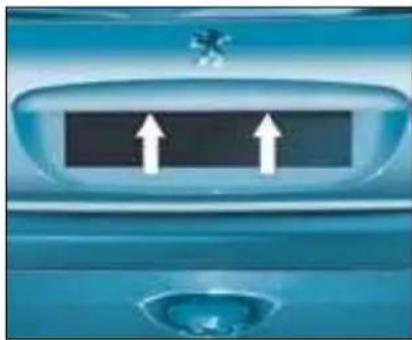 Close-up of a blue car interior with two white arrows pointing upward, no visible text or symbols