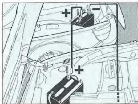 Technical diagram of a car interior showing battery, switch, and roof structure (no text or labels)