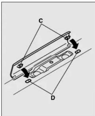 Technical diagram showing mechanical assembly with labeled components C and D, including directional arrows indicating motion or force.