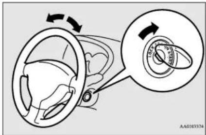 Diagram showing car steering wheel and rotary dial with directional arrows, including a magnified inset of the dial.