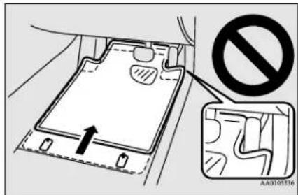 Diagram showing a vehicle interior with a 'No' symbol indicating no restriction, and an arrow pointing to a device component.