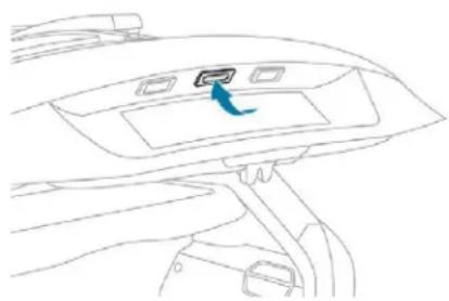 Line drawing of a car interior showing dashboard and seat area with a blue arrow indicating direction (no text or symbols)