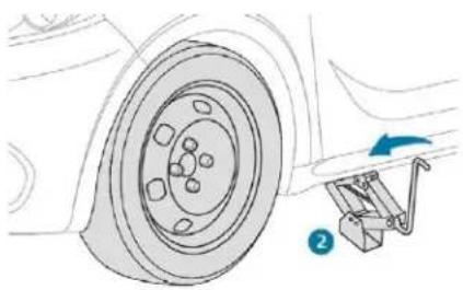 Diagram of a car wheel and attached vehicle tire with a blue arrow indicating motion (no text or symbols)