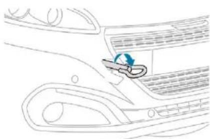 Line drawing of a car interior showing the dashboard and steering wheel (no text or symbols)