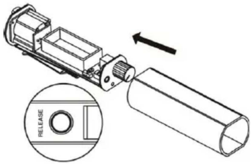 Technical illustration of a mechanical device with an inset showing a cylindrical component labeled 'RELEASE' (no text or symbols on the diagram itself)