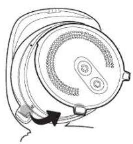 Diagram of a mechanical device with a circular component and directional arrow (no text or symbols)