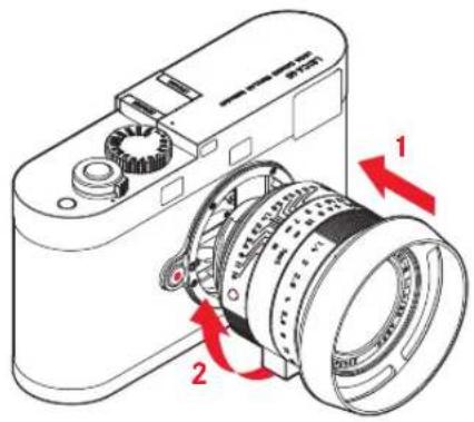 Technical diagram of a camera with labeled parts and directional arrows indicating rotation or movement.