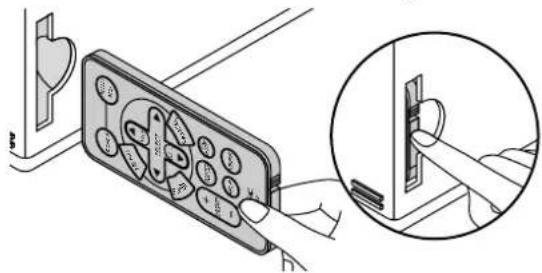 Diagram showing a handheld device with buttons and a magnified view of its internal component being inserted into a socket.