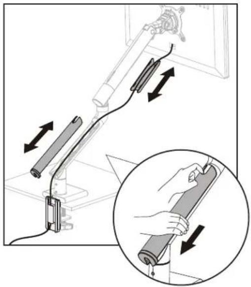 Diagram showing mechanical assembly with directional arrows and a magnified inset of a hand holding a cylindrical component (no text or symbols)