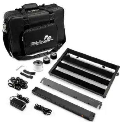 Black portable guitar pack with attached accessories and a multi-plate rack (no visible text or symbols)