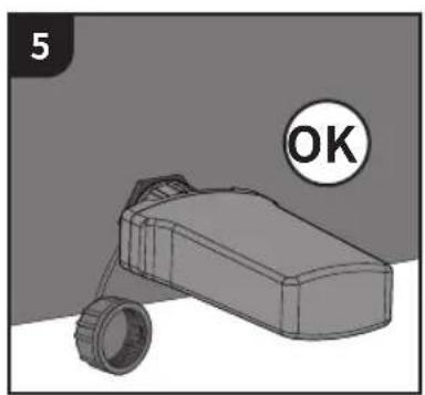 3D rendered object resembling a vehicle or mechanical component with a circular button labeled 'OK' (no text or symbols on the object itself)