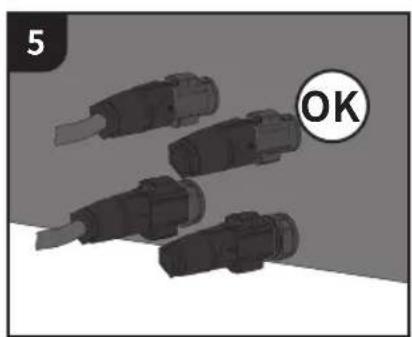 Illustration of four black industrial connectors with a circular 'OK' label, no text or symbols present