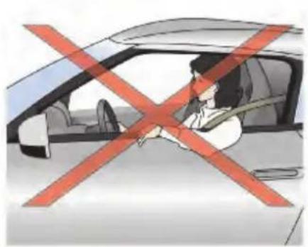 Diagram showing a person sitting in a car with a red 'X' symbol crossed out, indicating no restriction or rejection.